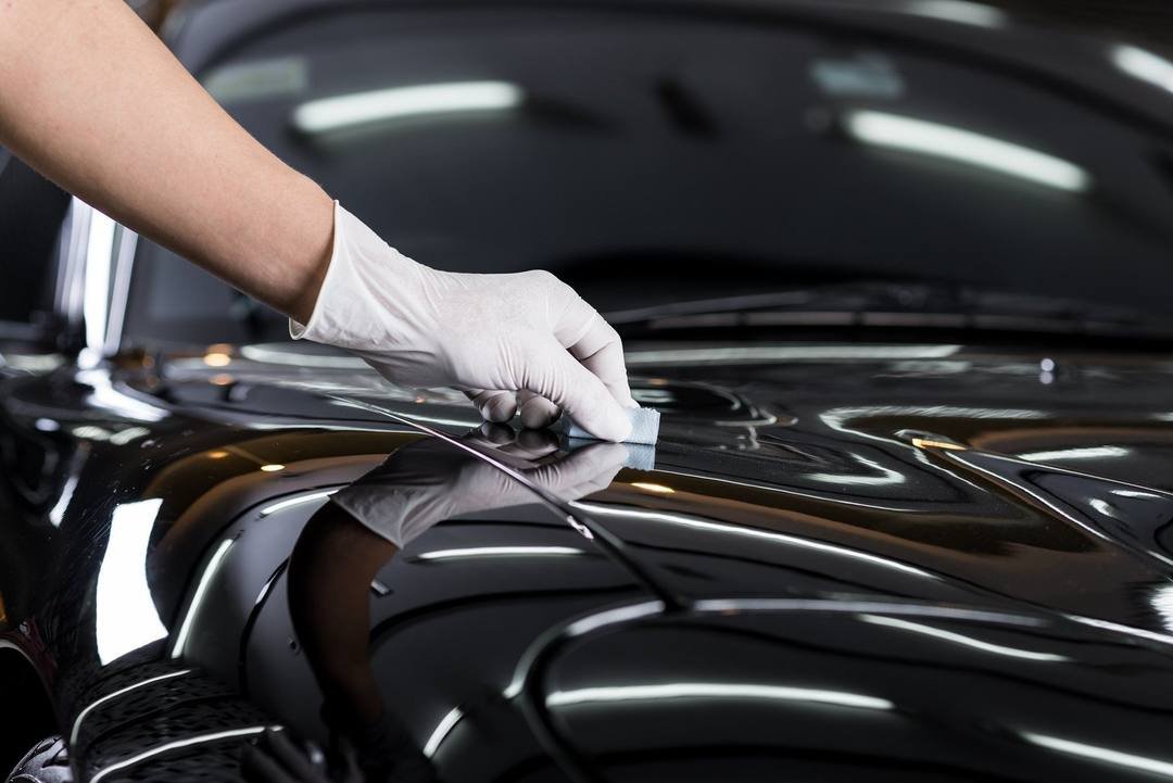 What Is Ceramic Coating? 1 What Is Ceramic Coating on a shiny black car surface