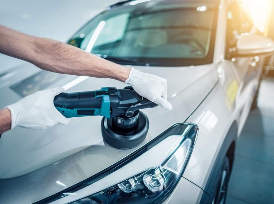 Technician explaining Mobile Detailing Packages to customer