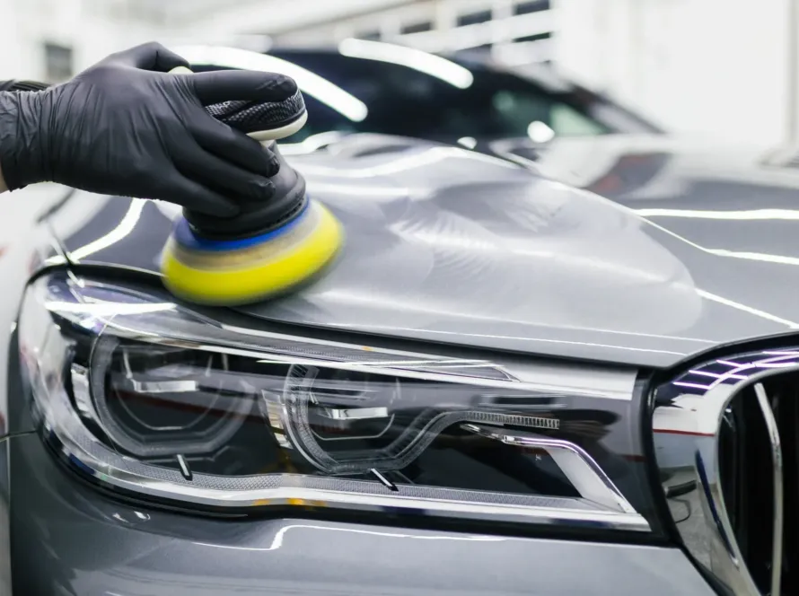 Detailer inspecting Holograms and Micro-Marring caused by improper polishing