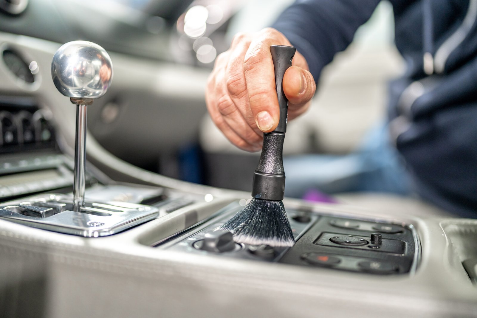 Car owner getting vehicle ready: How to Prepare for Mobile Car Detailing